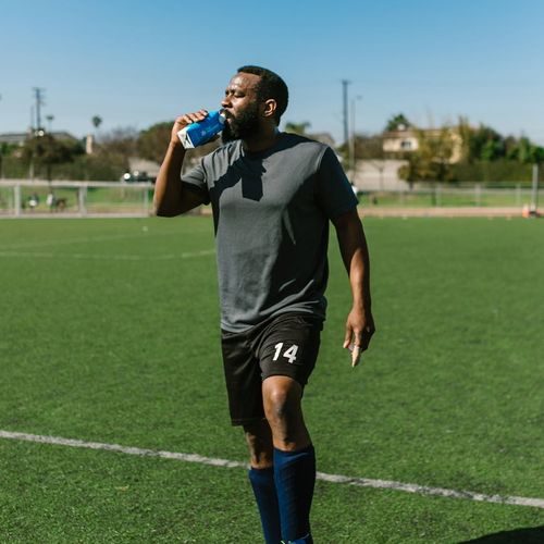 Active man stretching during a morning break